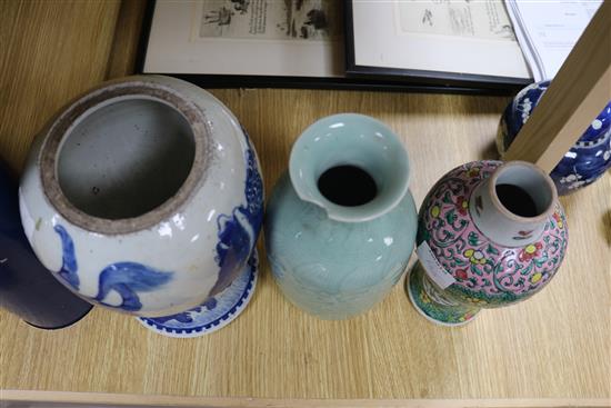 A Chinese blue and white dragon vase, a figure, two jars, teabowl and a famille verte vase